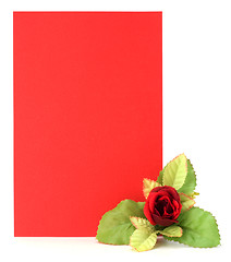 Image showing Card with floral decor. Flowers are artificial. 