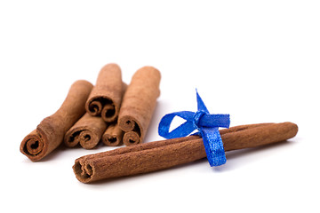 Image showing Cinnamon sticks isolated on white background 
