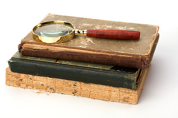 Image showing tattered book stack over white background