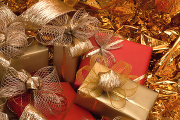 Image showing Christmas background. Shiny gifts.