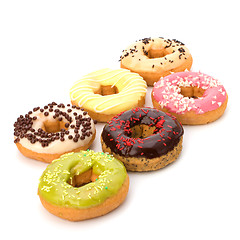 Image showing Delicious doughnuts isolated on white background 