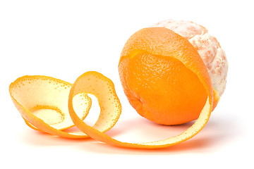 Image showing orange with peeled spiral skin isolated on white background