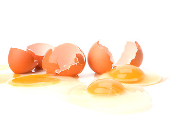 Image showing broken eggs isolated on white background