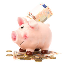 Image showing Business concept. Lucky piggy bank isolated on white background.