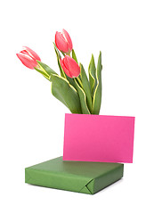 Image showing gift with pink tulips  isolated on white background