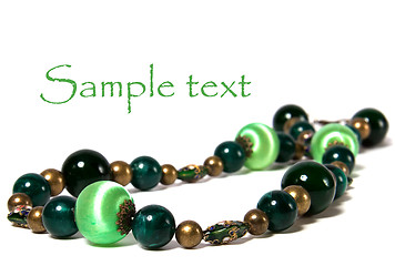 Image showing green beads isolated on white background