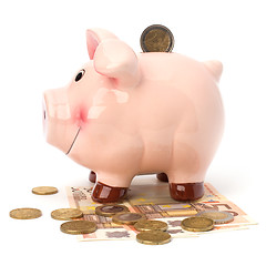 Image showing Business concept. Lucky piggy bank isolated on white background.