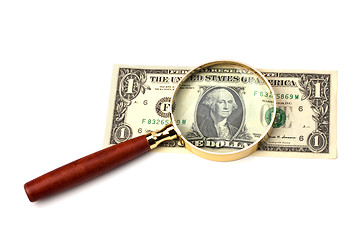 Image showing hand magnifier over banknote isolated on white background