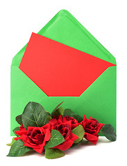 Image showing Envelope with floral decor. Flowers are artificial. 