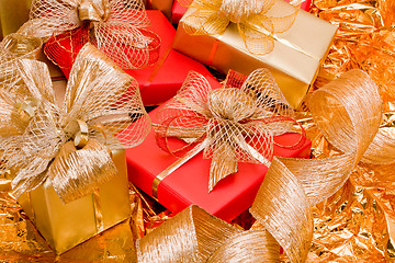 Image showing Christmas background. Shiny gifts.