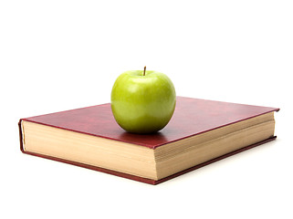 Image showing book with apple isolated on white background 