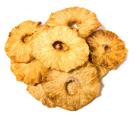 Image showing dried pineapples slices  isolated on white background
