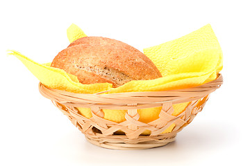 Image showing fresh warm rolls in breadbasket isolated on white background