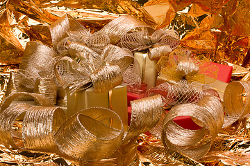 Image showing Christmas background. Shiny gifts.