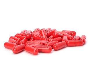 Image showing red capsules isolated on white background