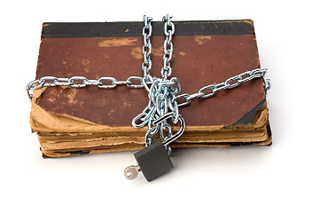 Image showing tattered book with chain and padlock isolated on white backgroun