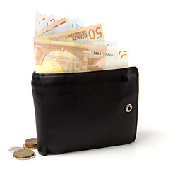 Image showing Money in leather  purse isolated on white  background 