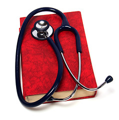 Image showing stethoscope on red book isolated on white background