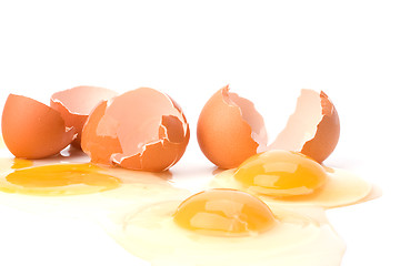 Image showing broken eggs isolated on white background