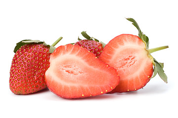 Image showing Halved strawberries isolated on white background