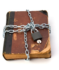 Image showing tattered book with chain and padlock isolated on white backgroun