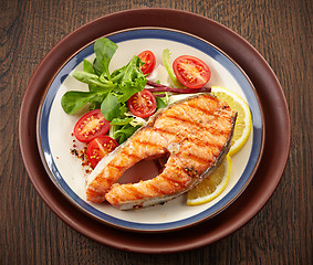 Image showing fresh grilled salmon steak slice