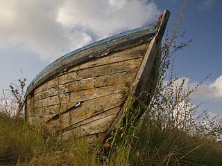 Image showing Old nautical vessel - abandoned on the dry land