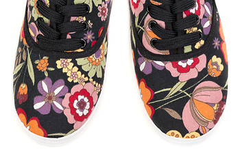 Image showing black sneakers with floral pattern i