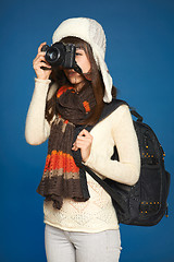 Image showing Winter woman  traveler with photocamera