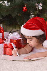 Image showing Little girl celebrating Christmas