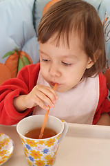 Image showing Little girl eating