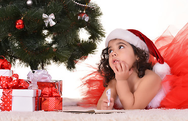 Image showing Little girl celebrating Christmas