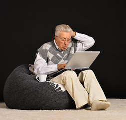 Image showing Elderly man with laptop