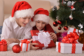 Image showing Happy children with gifts