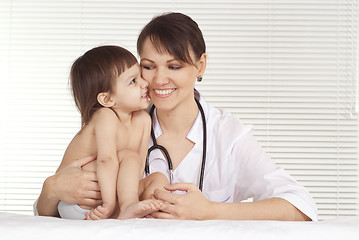 Image showing Pediatrician doctor with little girl