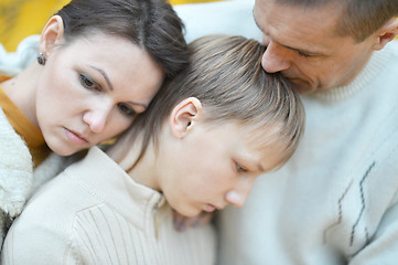 Image showing Sad family of three on the nature