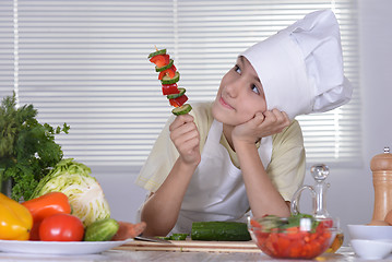 Image showing Cute boy preparing