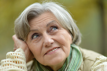 Image showing Thoughtful senior woman in autumn