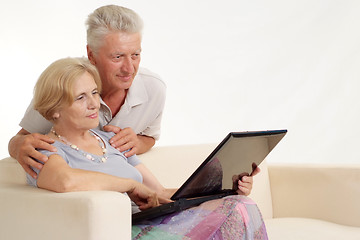 Image showing Elderly couple with laptop