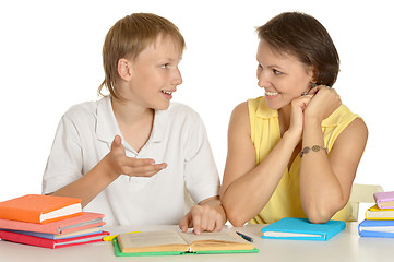 Image showing Mother helping her son