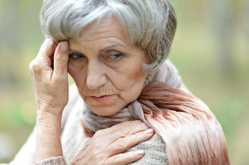 Image showing Pensive elderly woman