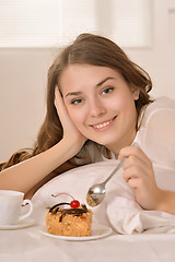 Image showing Young Caucasian woman lying in bed