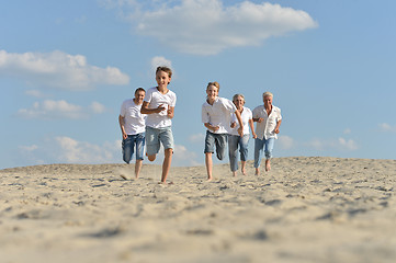 Image showing happy family running