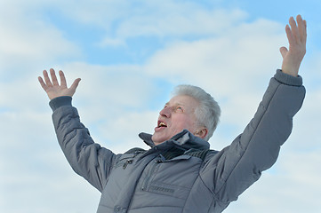 Image showing Elderly man standing outdoors