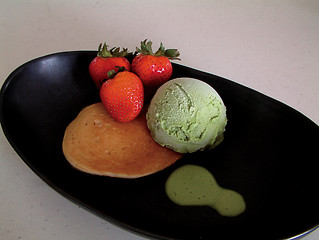 Image showing Strawberry pancakes with ice cream