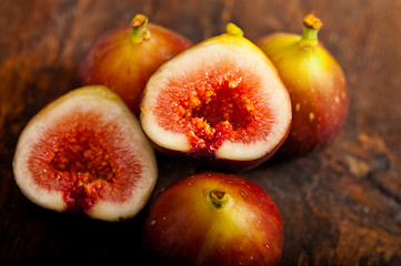Image showing fresh figs over old wood