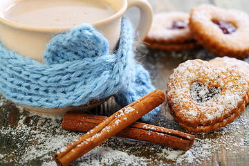 Image showing Cookies in the form of heart, cinnamon and cocoa.