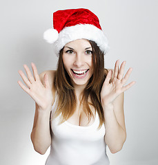 Image showing Amazed christmas girl