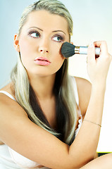 Image showing Girl doing makeup