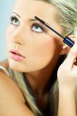 Image showing Girl doing makeup